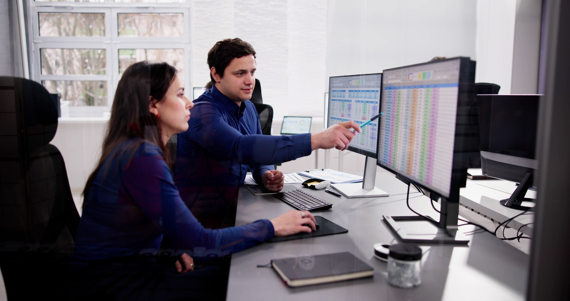 Analyst Working With Spreadsheet Business Data